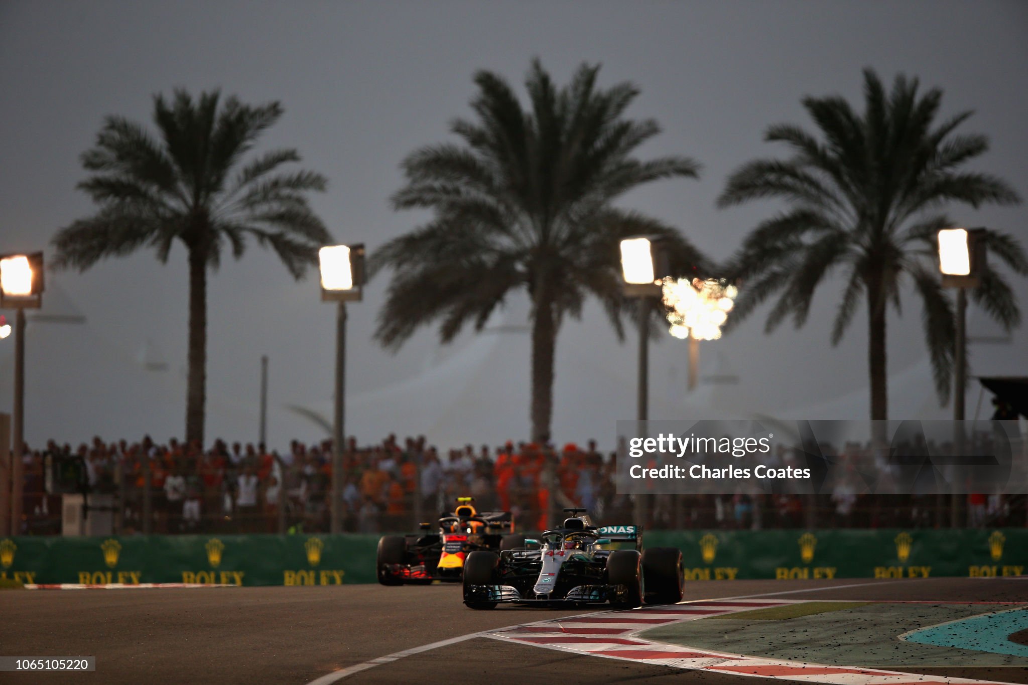 Lewis Hamilton driving the Mercedes AMG WO9 leads Max Verstappen driving the Red Bull RB14 on track during the Abu Dhabi Formula One Grand Prix at Yas Marina Circuit on 25 November 2018 in Abu Dhabi, United Arab Emirates. 