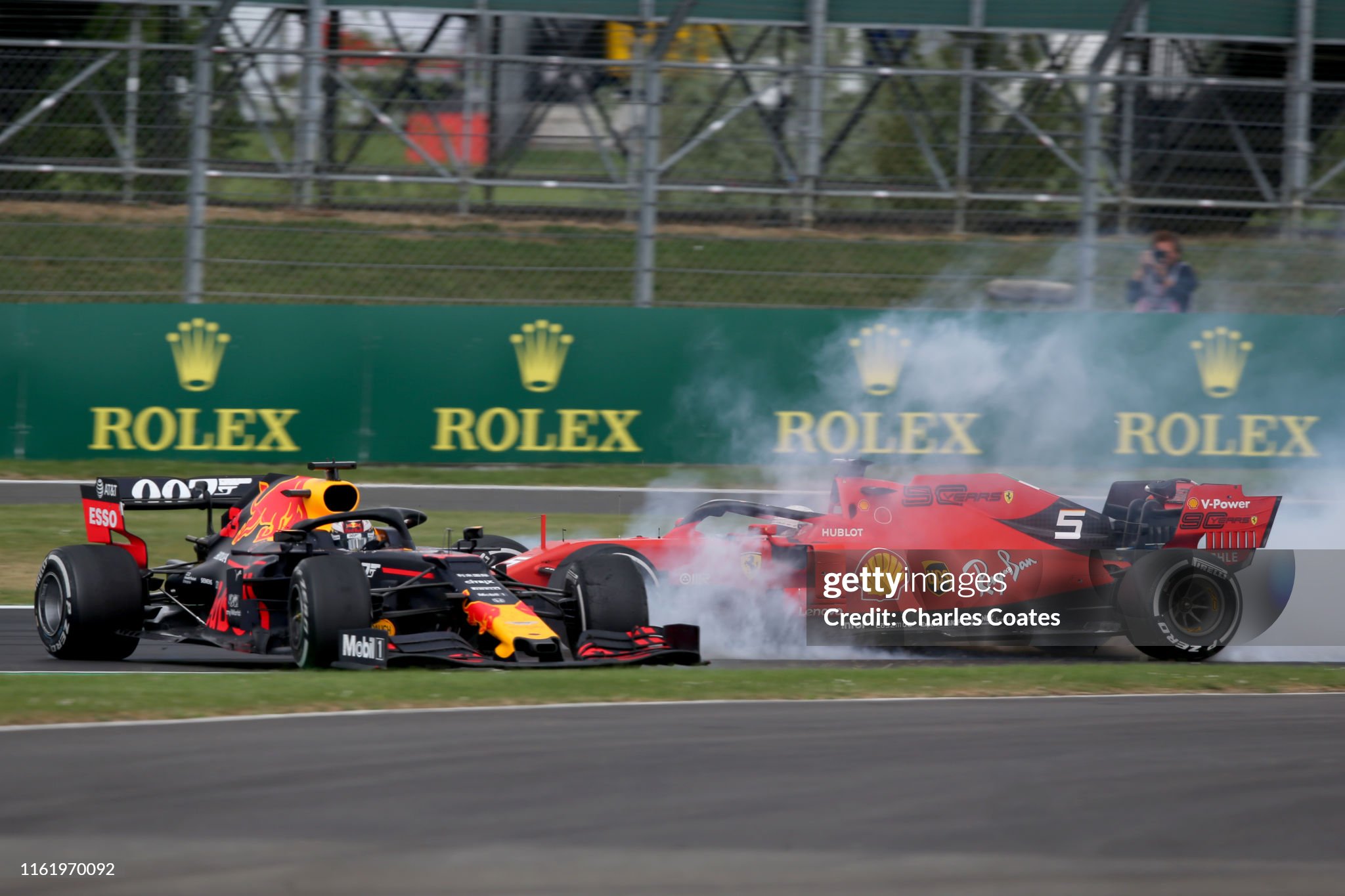 Max Verstappen driving the Red Bull RB15 and Sebastian Vettel in a Ferrari SF90 crash during the F1 Grand Prix of Great Britain at Silverstone on July 14, 2019. 