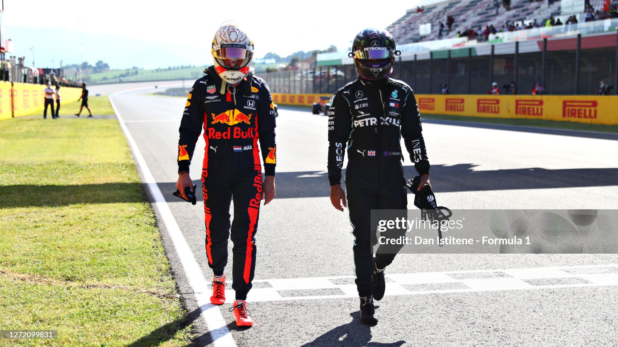 Pole position qualifier Lewis Hamilton and third placed qualifier Max Verstappen walk in parc ferme after qualifying for the F1 Grand Prix of Tuscany at Mugello Circuit on 12 September 2020 in Scarperia, Italy. 