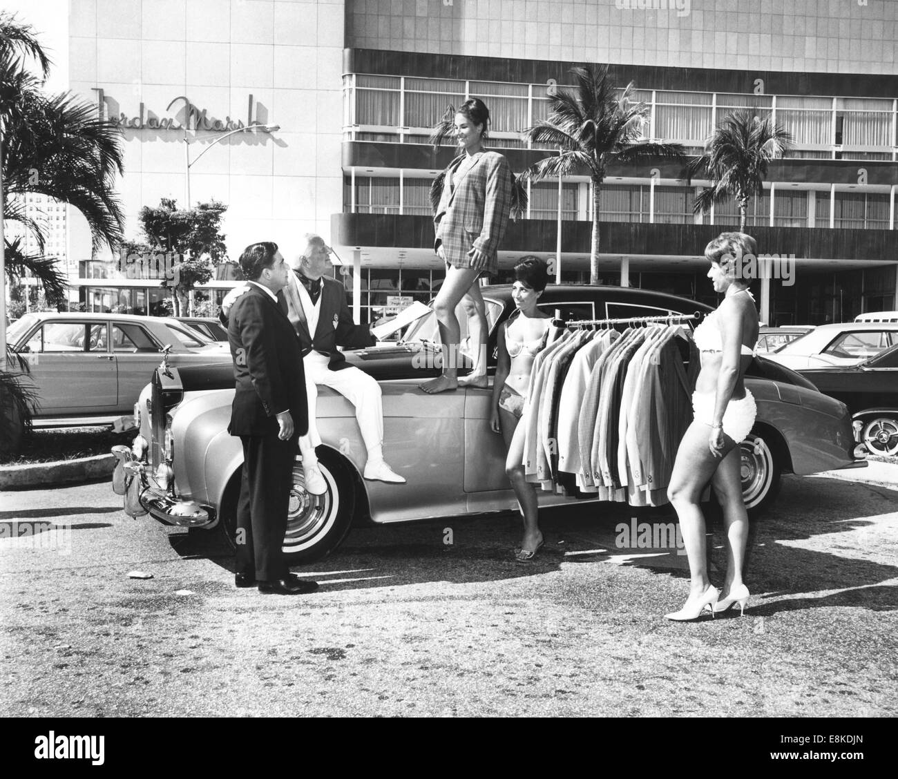 Unknown girls and a Rolls Royce Silver Cloud at Miami Beach, Florida, on 14 September 1966.