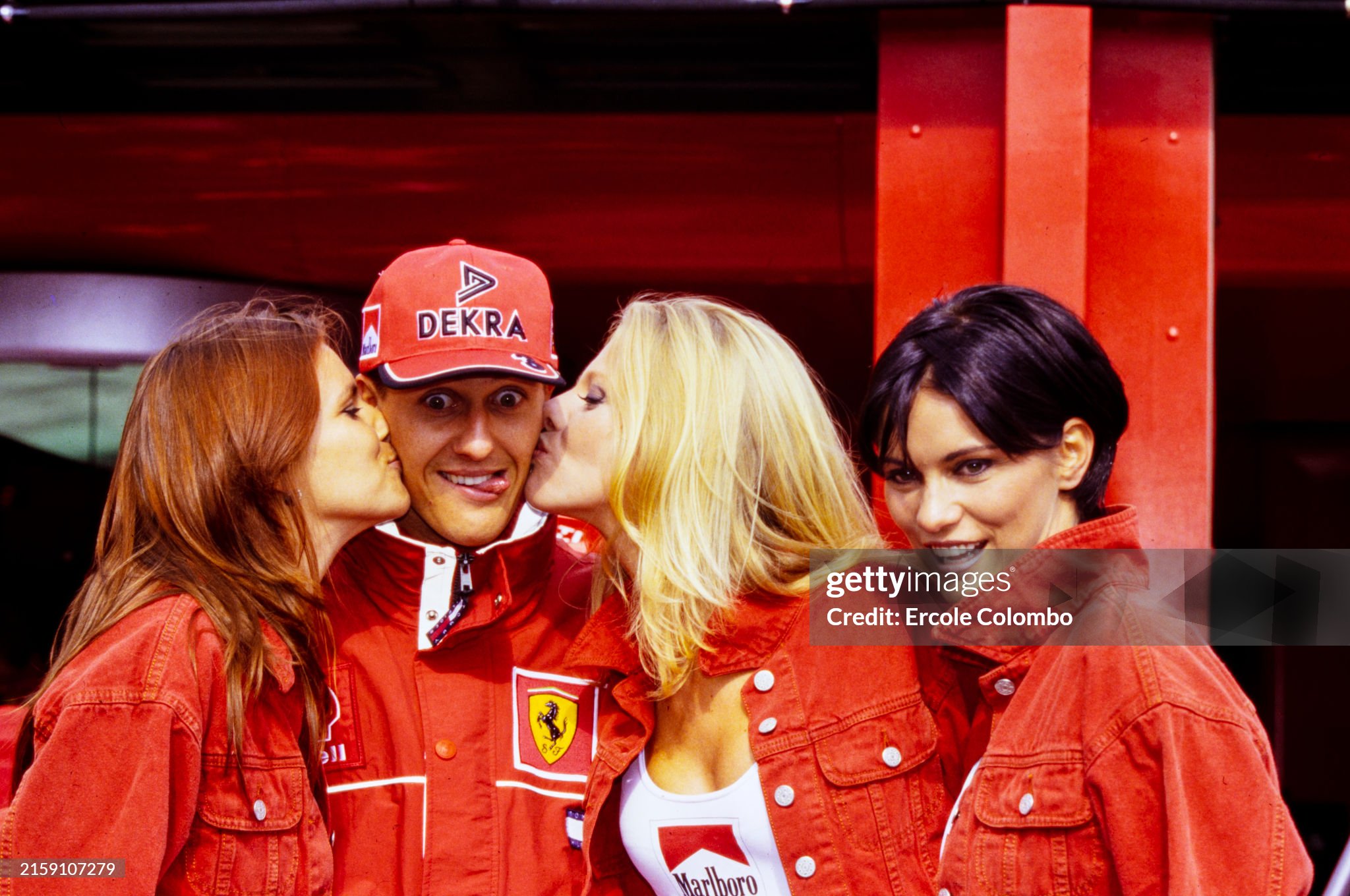 Michael Schumacher with Marlboro models during the Belgian GP at Circuit de Spa Francorchamps on Sunday August 30, 1998. 