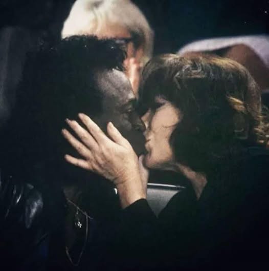 Miles Davis kissing Juliette Gréco.
