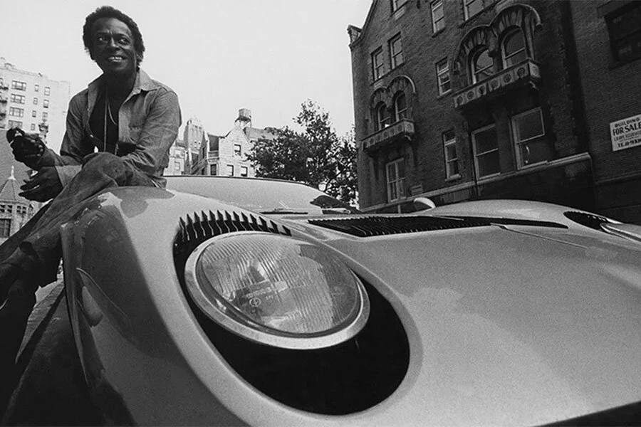 Miles Davis on a Lamborghini Miura.