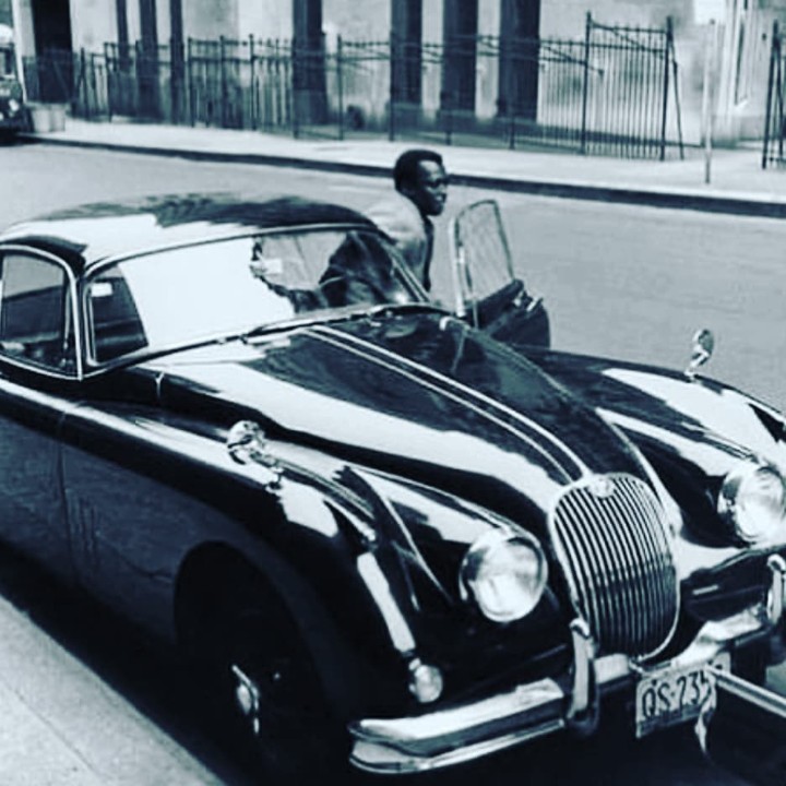Miles Davis and his Jaguar XK150.