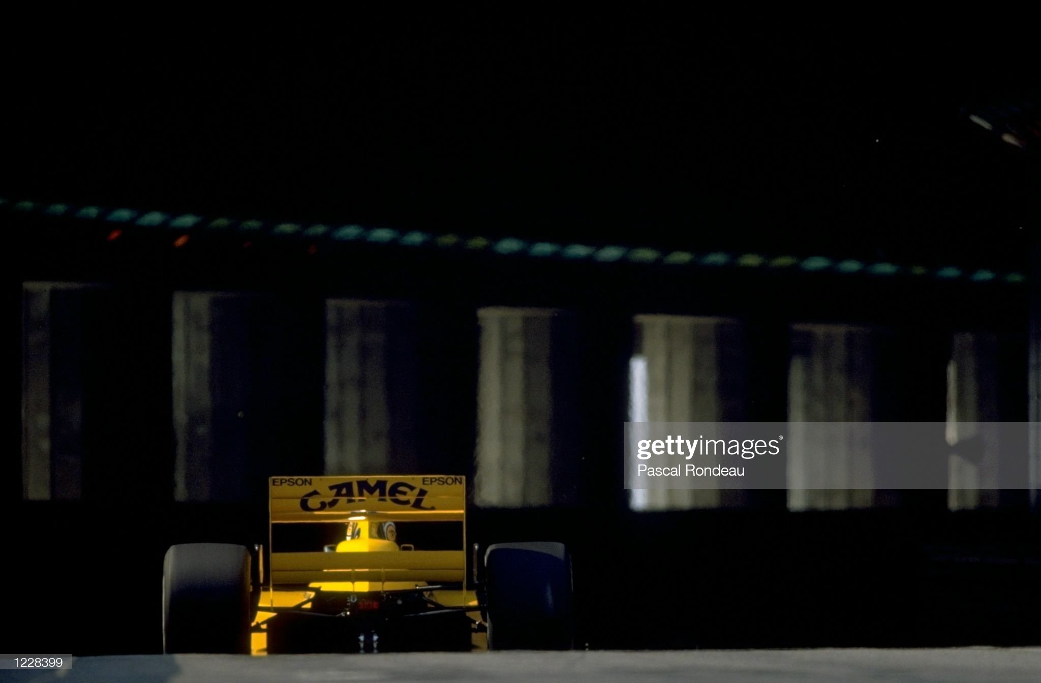 Rear view of Nelson Piquet of Brazil as he enters the tunnel in his Lotus Judd during the Monaco Grand Prix in 1989.