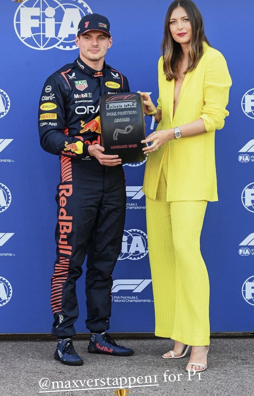 Max Verstappen receives the trophy from a bra-less Maria Sharapova in Monaco GP on May 27, 2023.