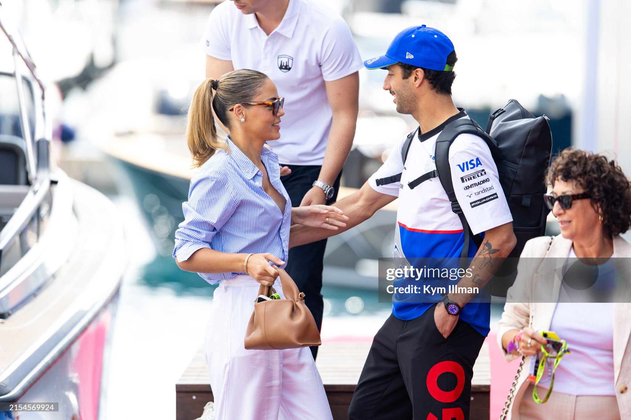 Daniel Ricciardo of Australia and Visa Cash App RB arrives with girlfriend Heidi Berger during qualifying ahead of the F1 Grand Prix of Monaco on May 25, 2024. 