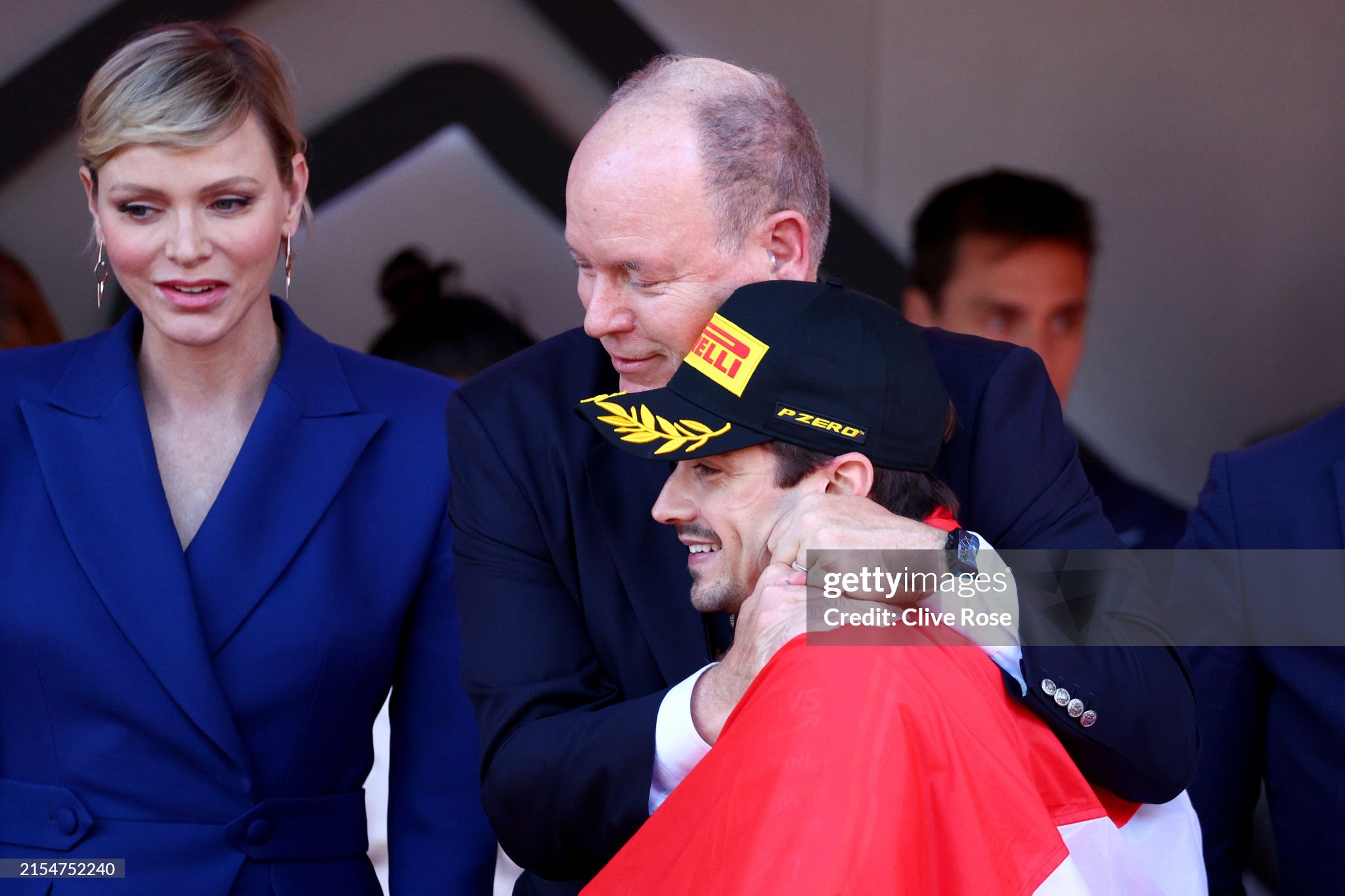 Charles Leclerc celebrates with Prince Albert of Monaco on the podium after the F1 Grand Prix of Monaco on May 26, 2024. 