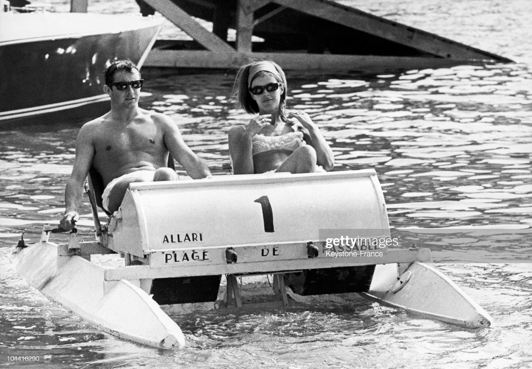 The winner of the Monaco Grand Prix Jackie Stewart and his wife Helen relaxing in a pedal boat in Monaco on May 23, 1966.