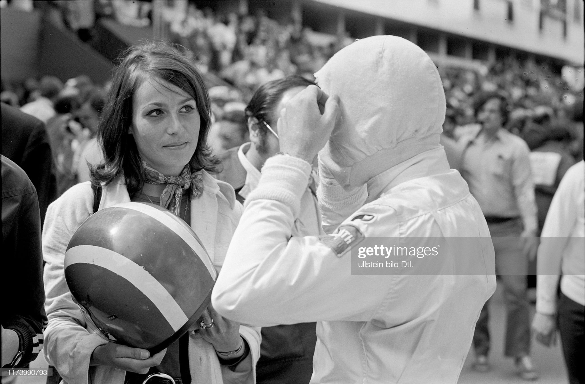 Joe Siffert with a girl just before the starting of the 1971 Monaco GP. 