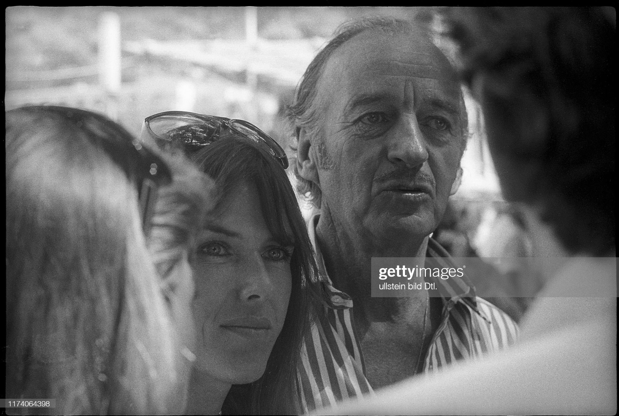 Helen Stewart with Alec Guinness at the 1974 Monaco Grand Prix.