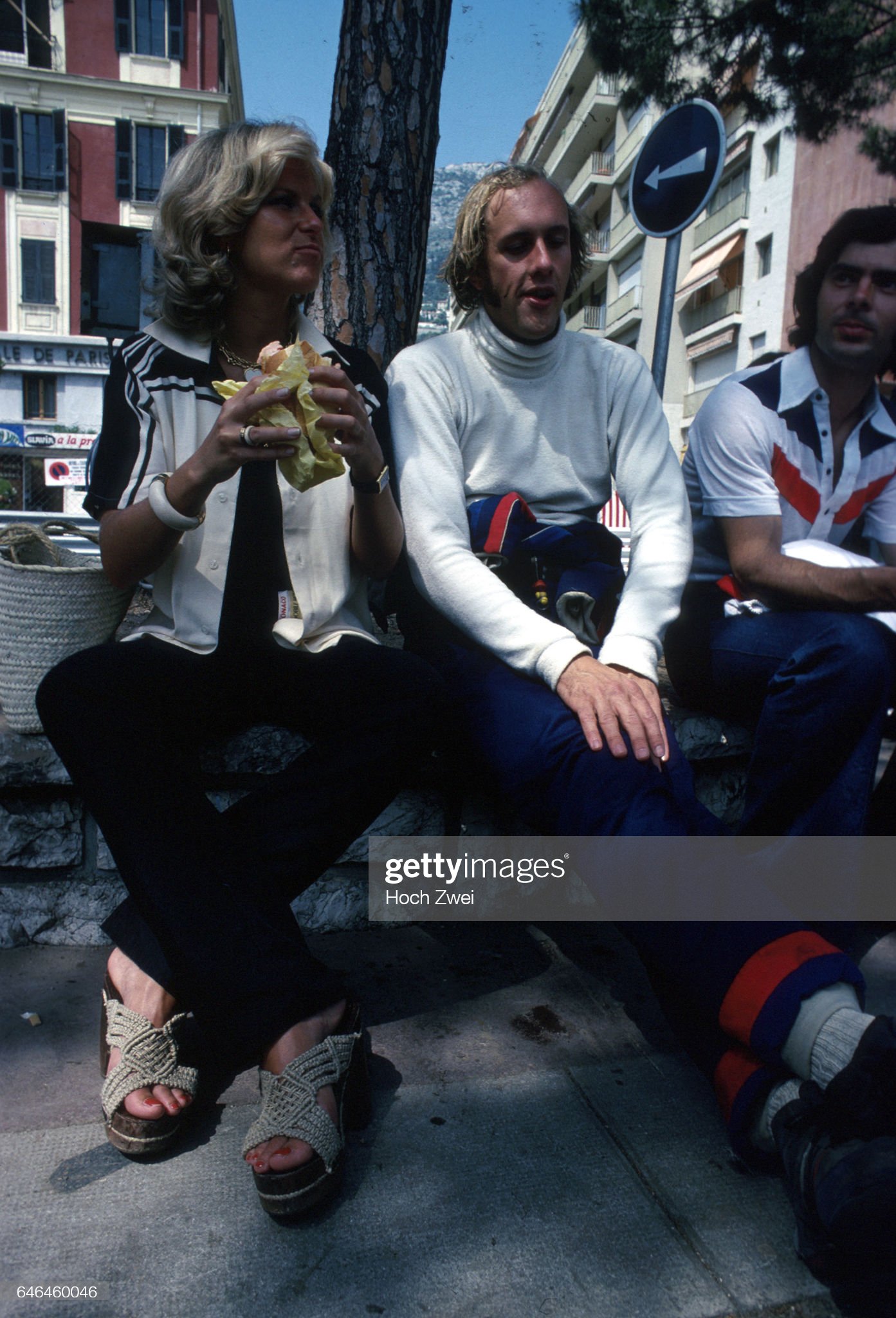 Hans Joachim Stuck with a woman at the 1976 Monaco Grand Prix. 