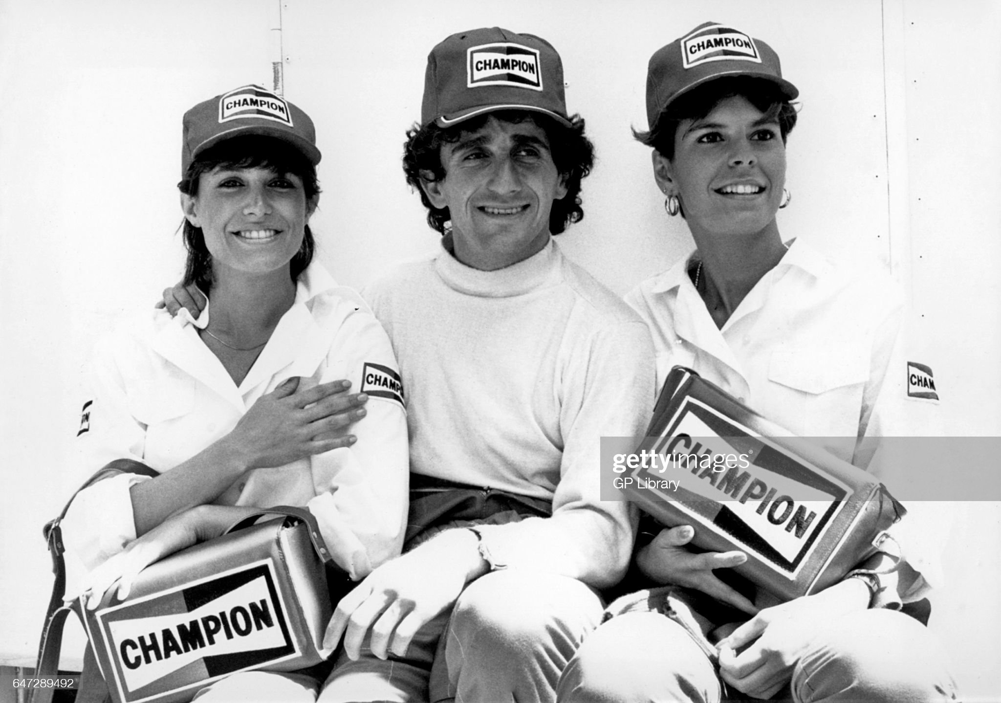 Alain Prost with two girls in Monaco, 1985. 