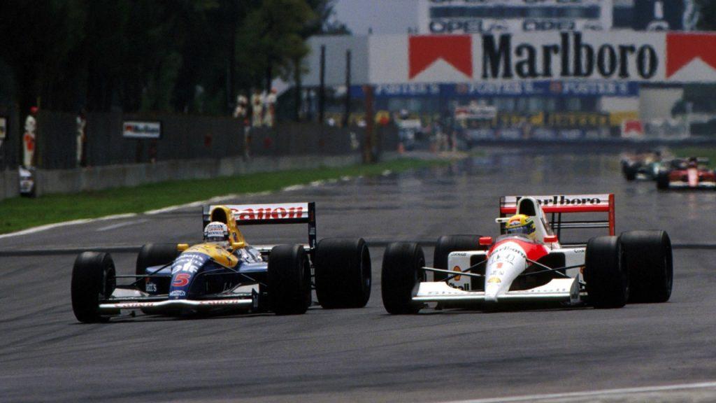 Second place finisher Nigel Mansell, Williams FW14 and third place finisher Ayrton Senna, McLaren MP4/6, battle for position. Mexican Grand Prix, Mexico City, 16 June 1991.