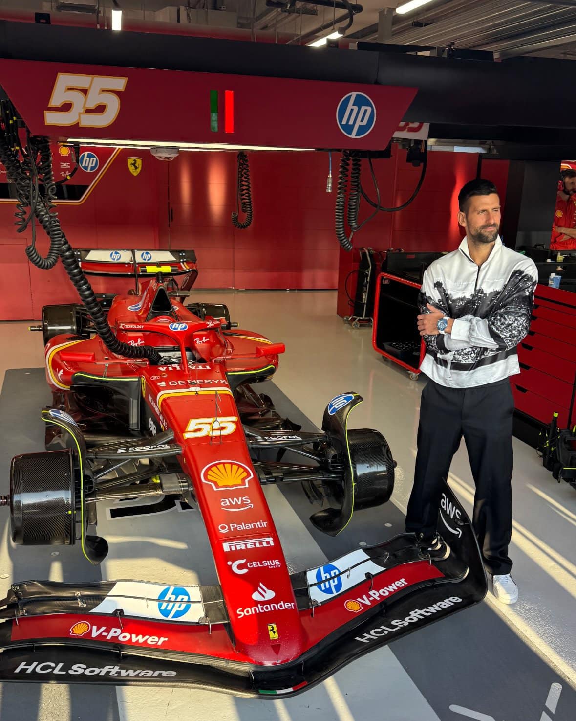 Novak Djokovic in the Ferrari garage at the 2024 Qatar Grand Prix.