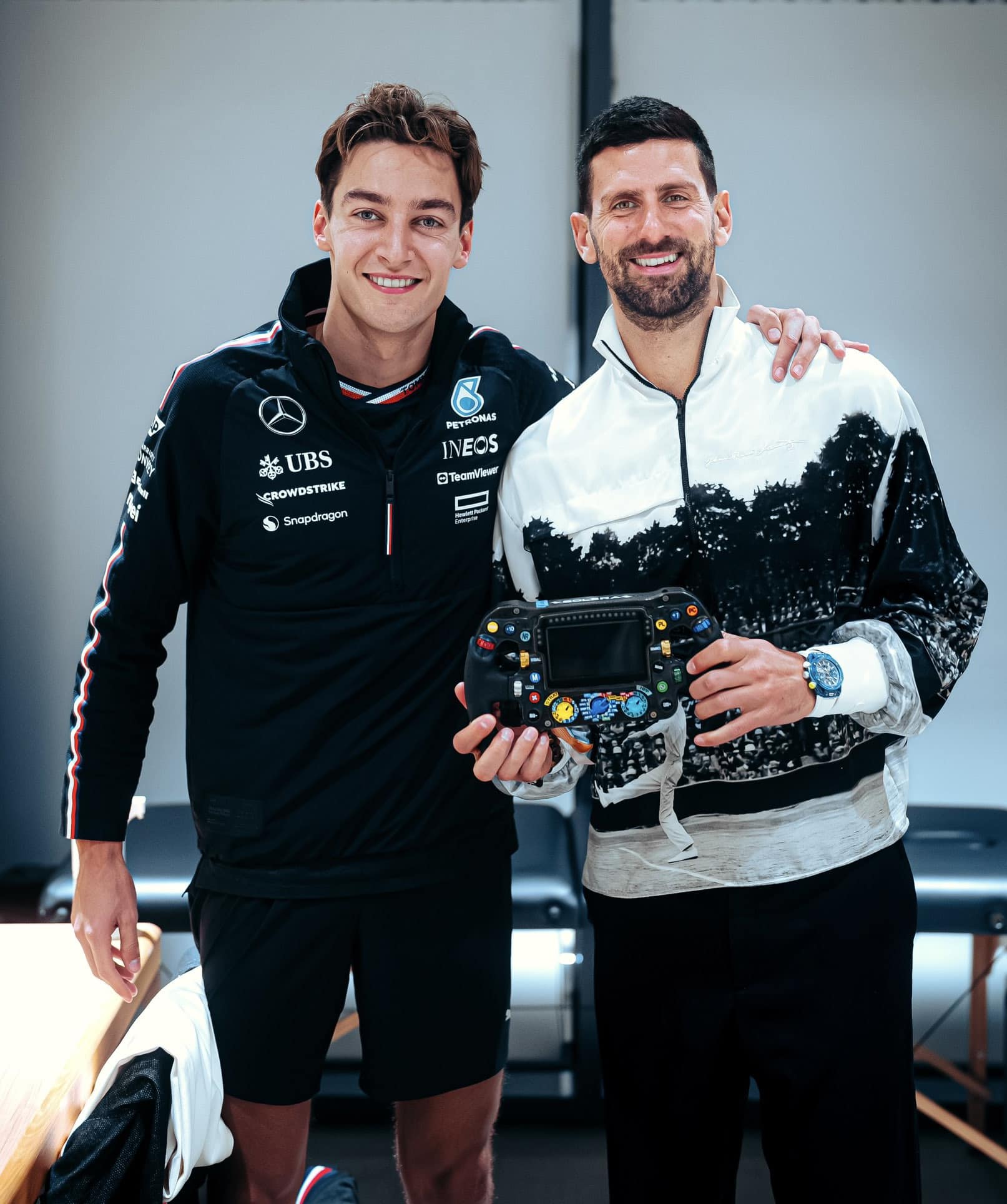 Novak Djokovic with George Russell, Mercedes, at the 2024 Qatar Grand Prix.