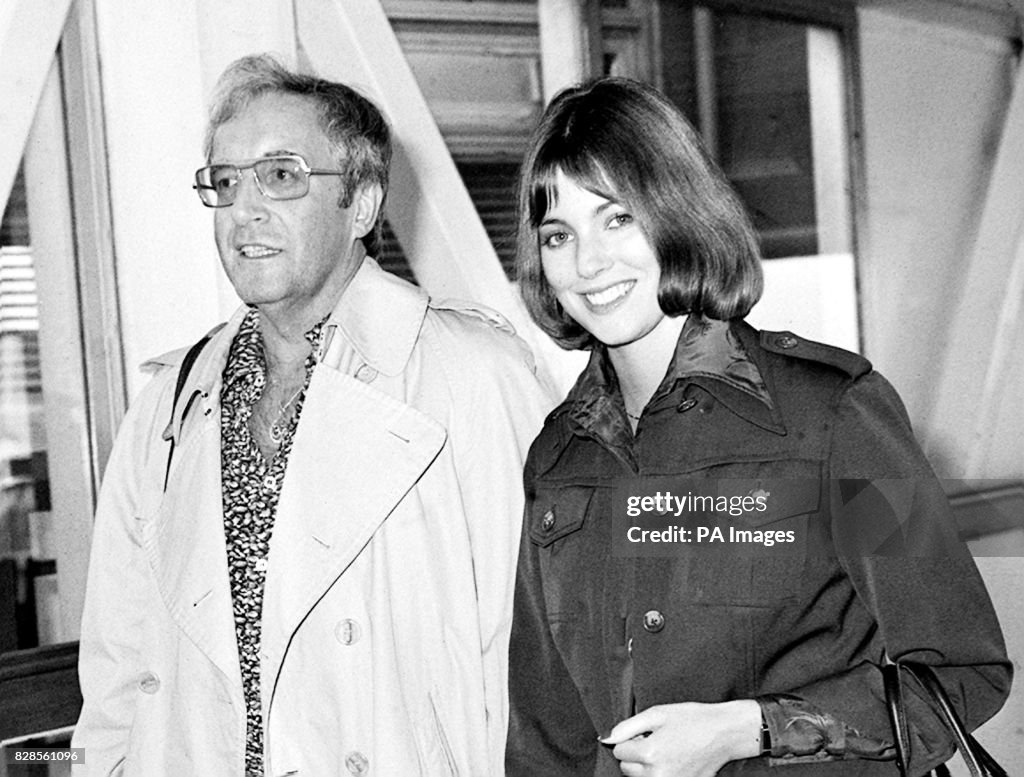 Peter Sellers and his girlfriend Lynne Frederick at Heathrow on arrival from the Seychelles on December 04, 1976.
