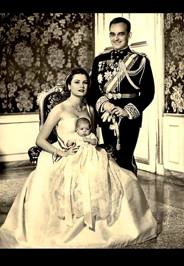 The first official photograph of baby Princess Caroline with her parents in 1957.