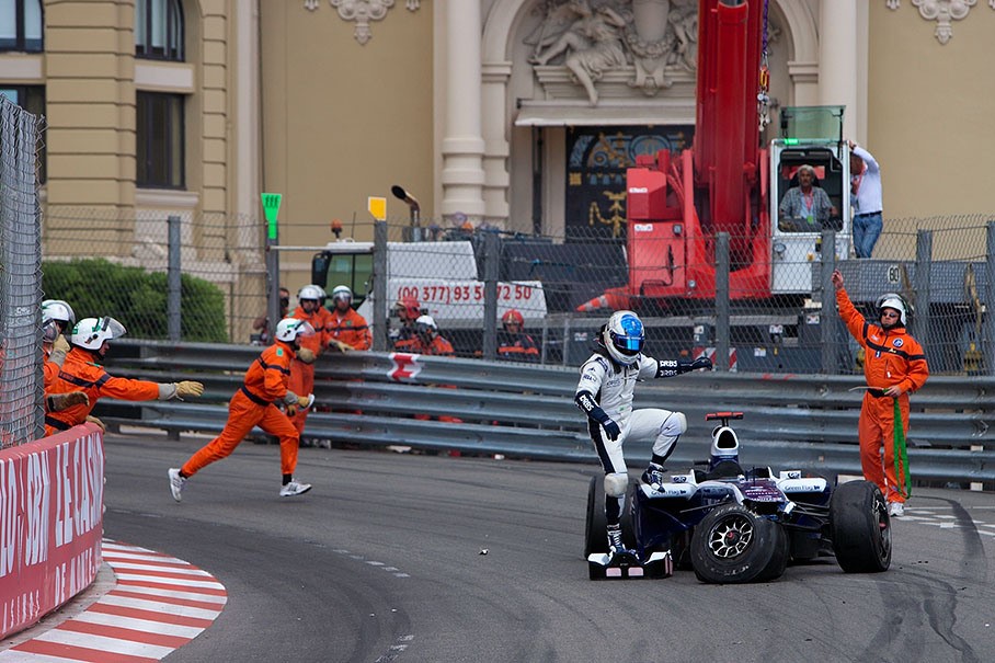 Rubens Barrichello exits the destroyed Williams car at Massenet turn at the Monaco GP in June 2010. 