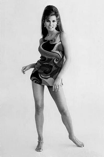 Portrait of Raquel Welch in mini skirt.