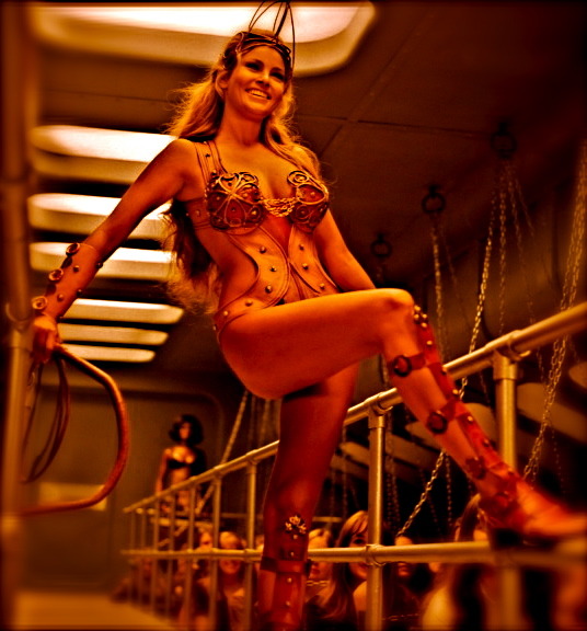 Raquel Welch as Mistress of the whip in the satire ‘The magic Christian in 1969.