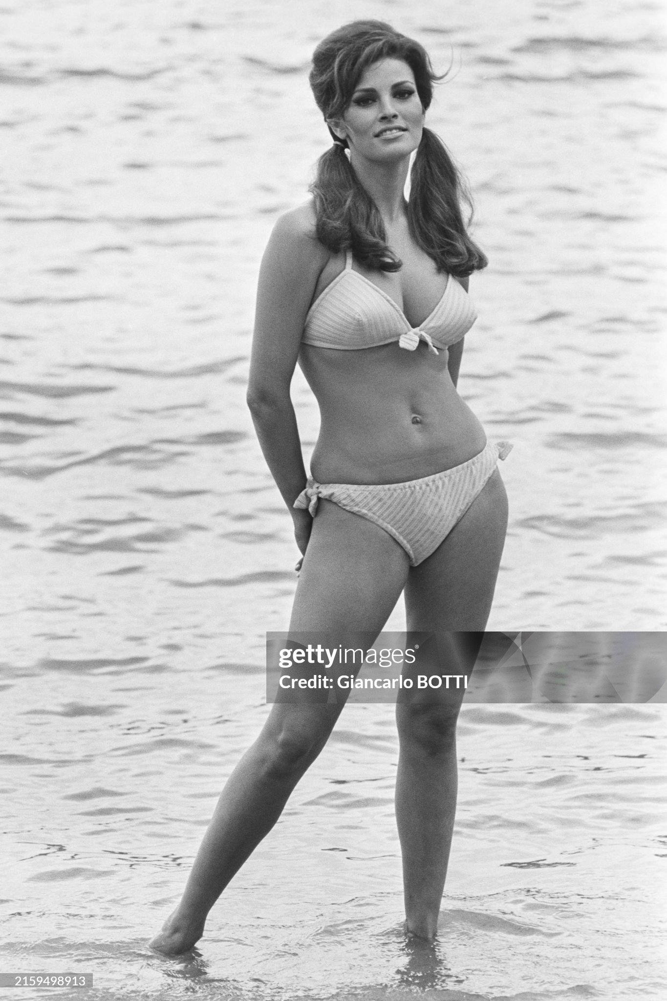 American actress Raquel Welch in a bikini on a beach in the Côte d'Azur in June 1974. 