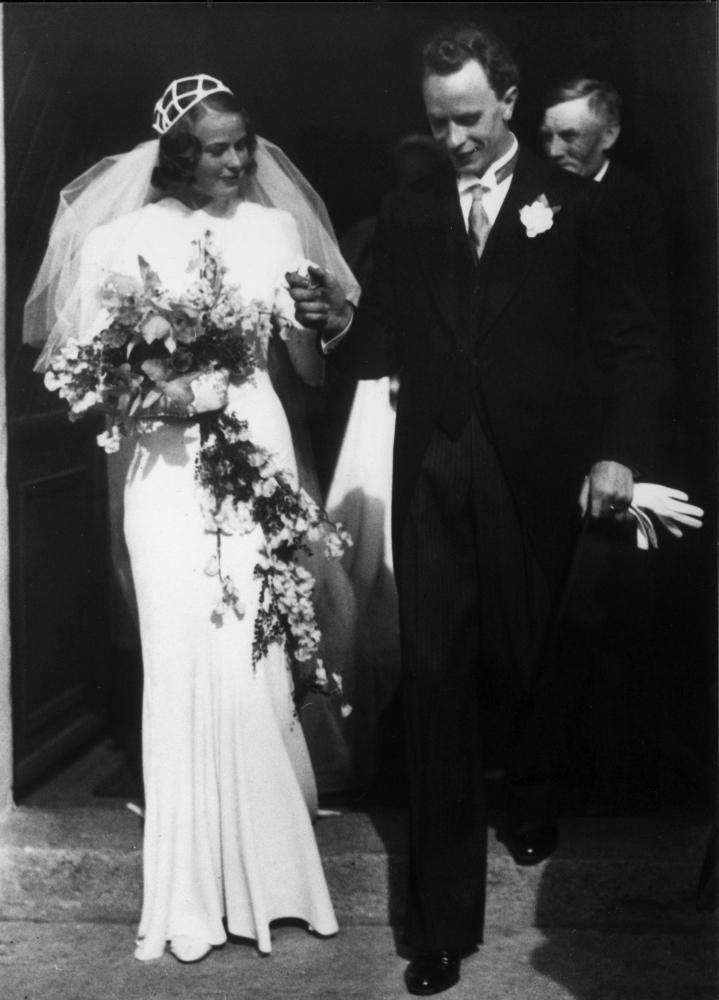 Ingrid Bergman wed her first husband Petter Lindström in a caged Juliet cap and pin curls, 1937.