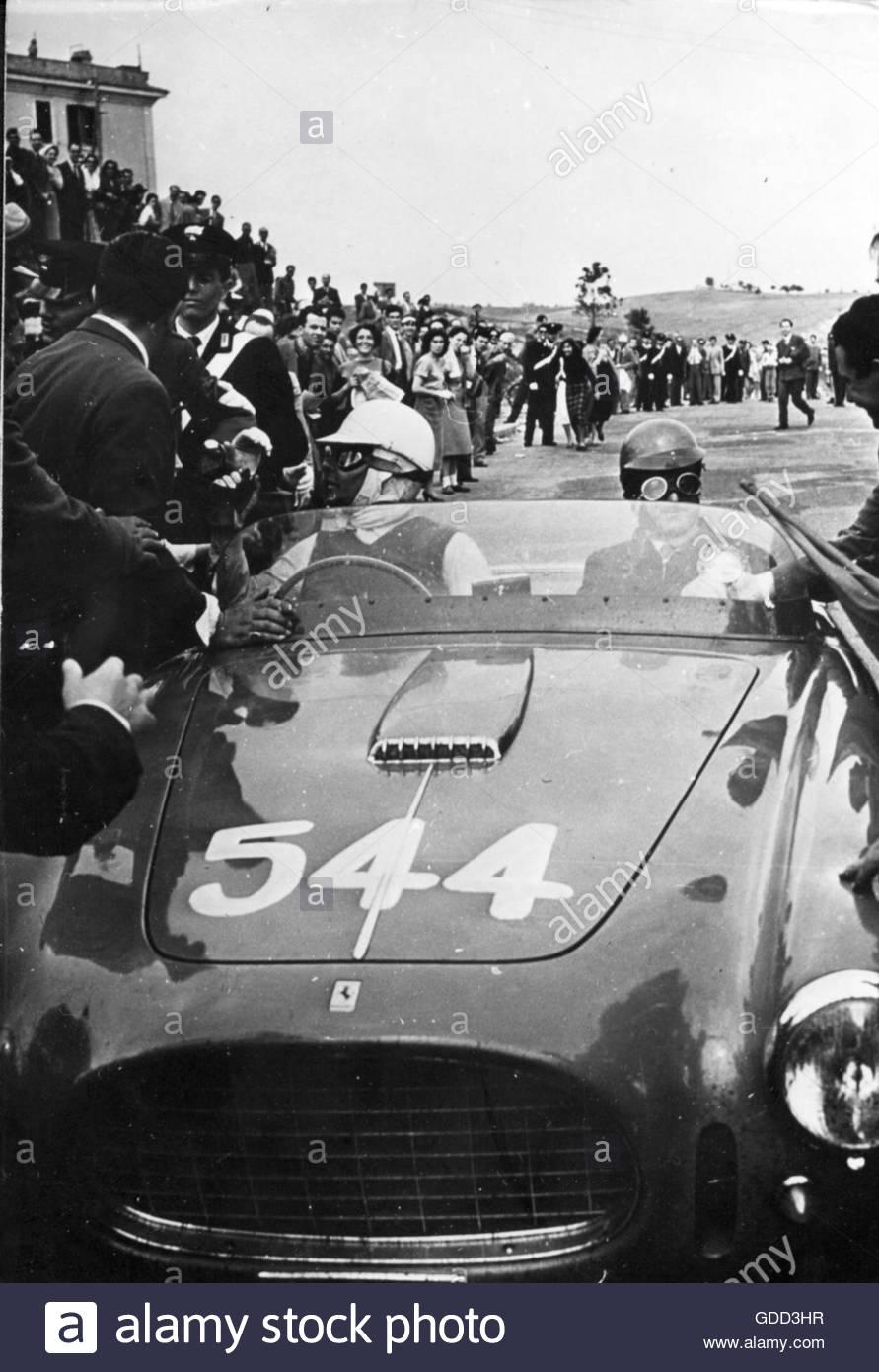 Rossellini as participant of the Mille Miglia car race, Rome, 28.4.1953.