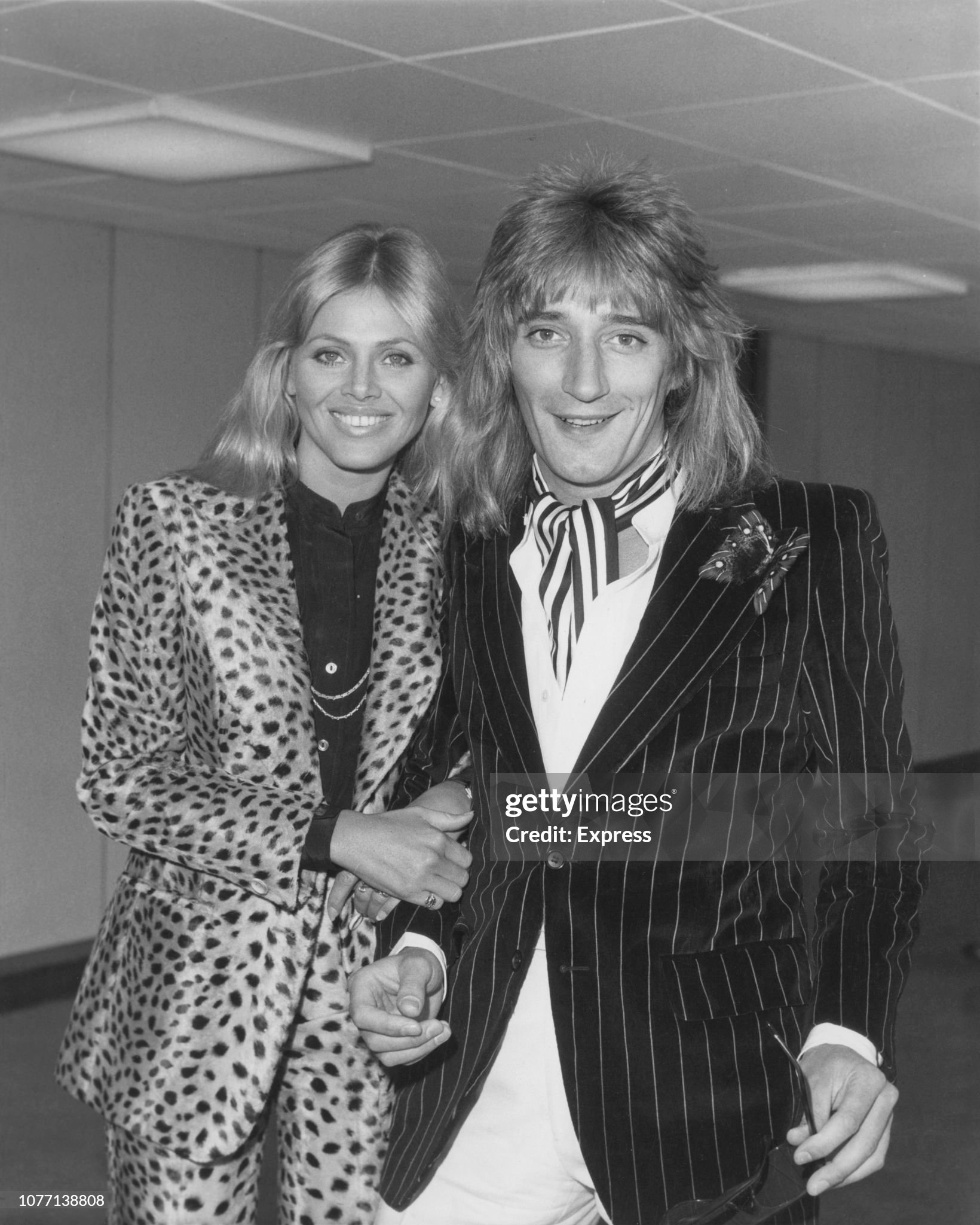 Rod Stewart and his partner, actress Britt Ekland, arrive at London's Heathrow Airport from America on 29 April 1976. 