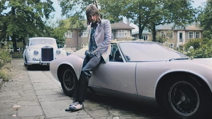 Rod Stewart with a Rolls Royce Silver Cloud and a Lamborghini Miura.