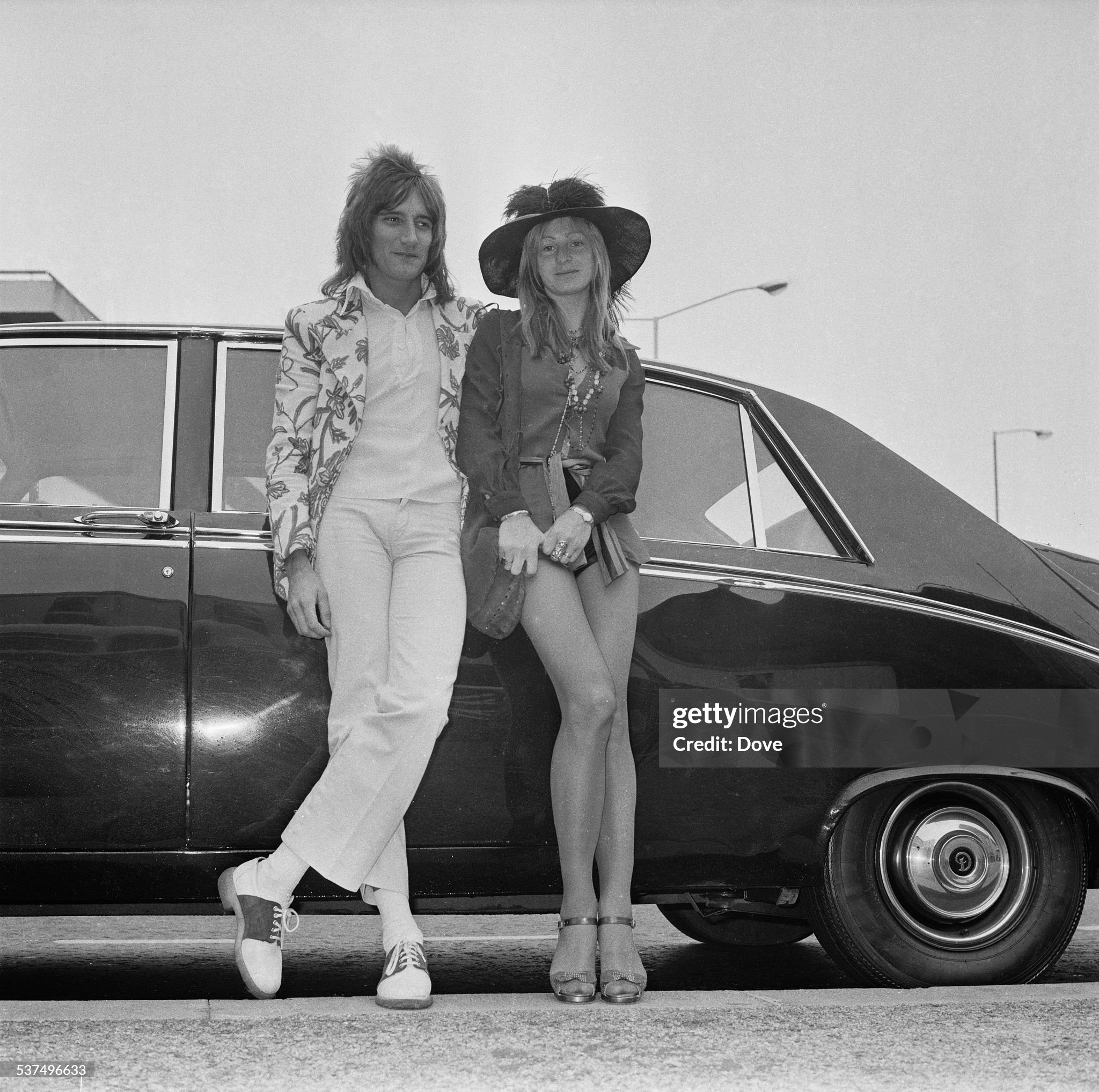 Rod Stewart and girlfriend fashion model Dee (Deidre) Harrington at London airport on 20 May 1972. 
