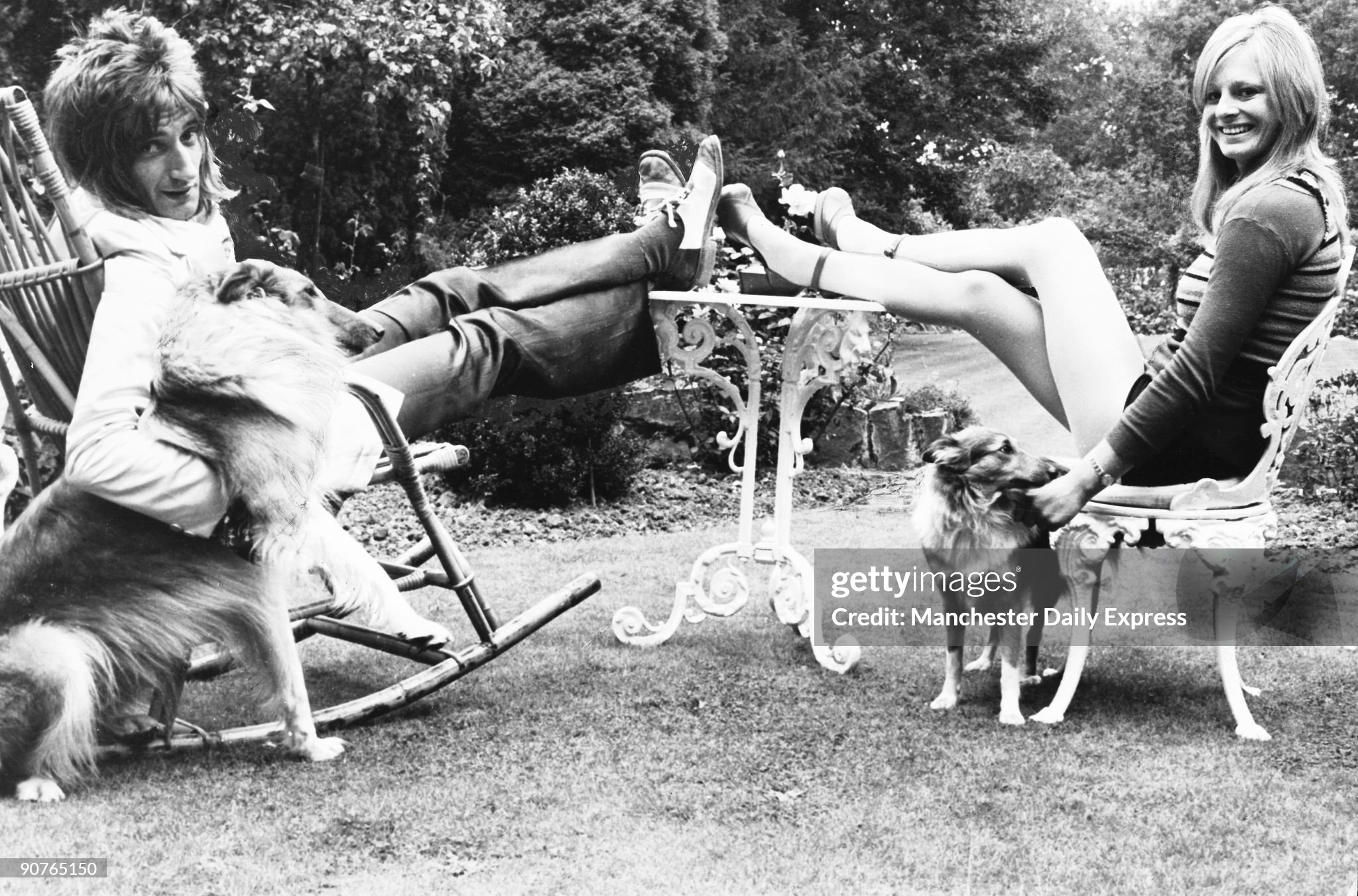 British pop star Rod Stewart with his fiancee Dee Harrington and dogs in September 1973. 