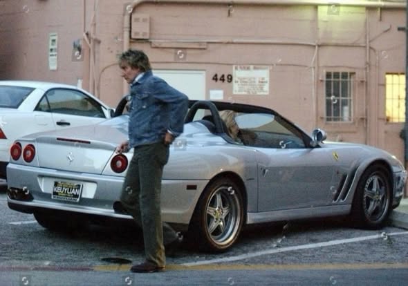Rod Stewart with his Ferrari 550 Barchetta.