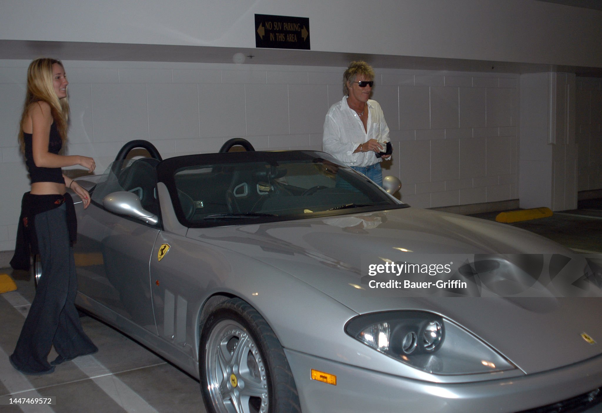 Rod Stewart is seen on 01 May 2004 in Los Angeles, California, with his Ferrari and a blonde girl. 