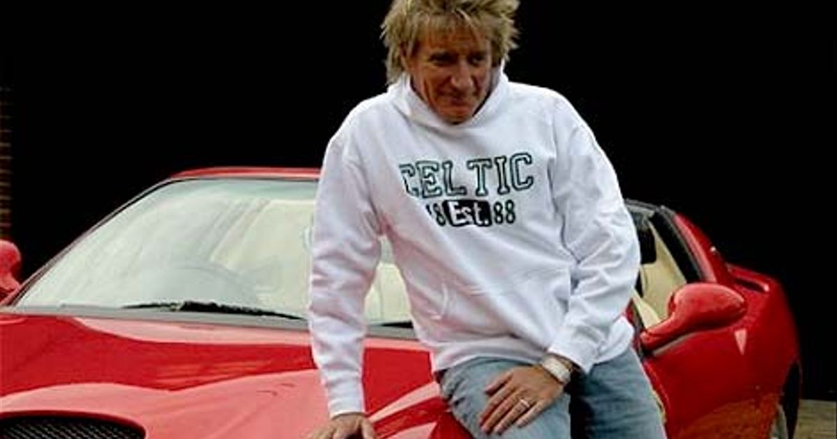 Rod Stewart with another red Ferrari.