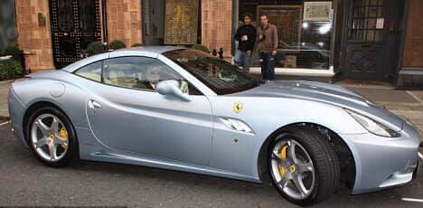 Rod Stewart in a Ferrari California.