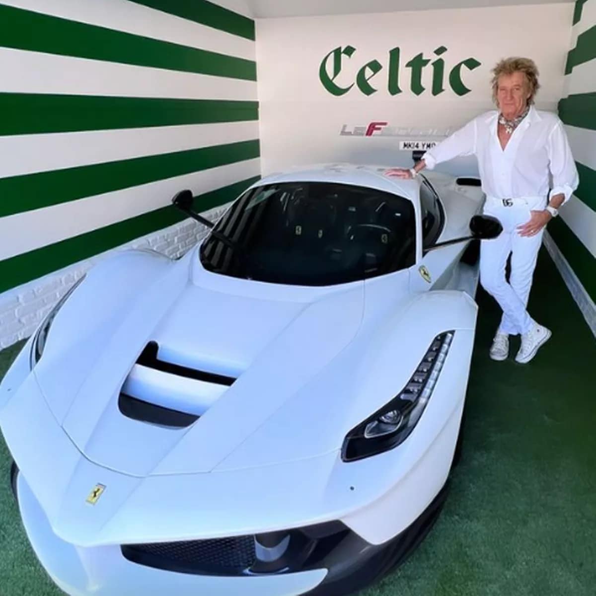 Rod Stewart proudly showed off his new purchase after spending three years tracking down his dream car. The singer, 78, took to Instagram to show off his LaFerrari which he proudly parked inside his Celtic FC-themed garage. 