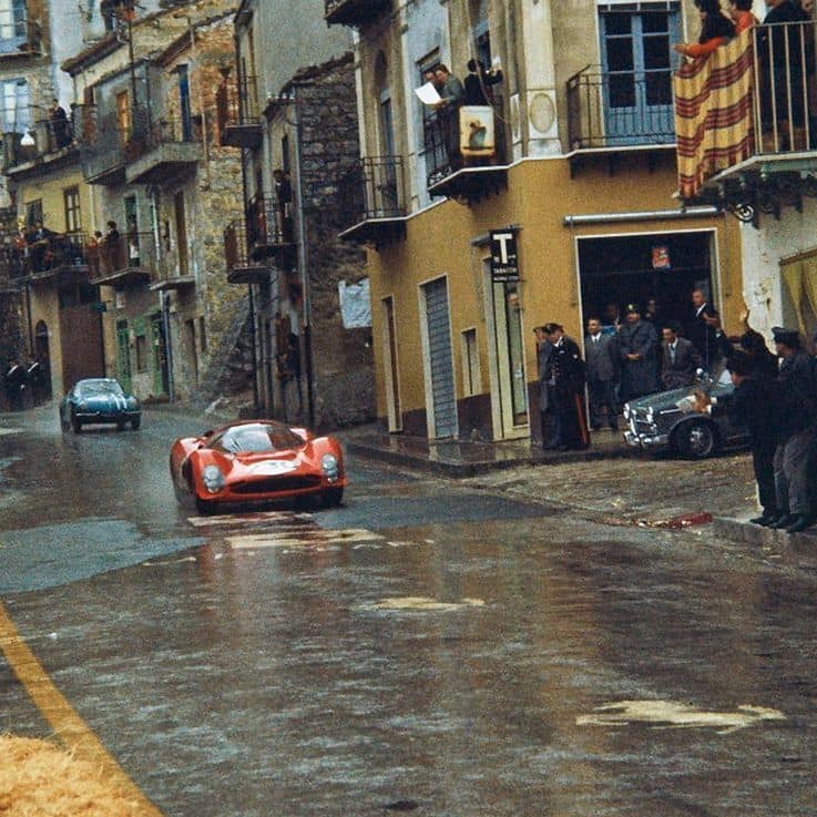 The Ferrari 330 P3 of Vaccarella - Bandini in front of one of the two Alpine A110s during the 1966 Targa Florio.