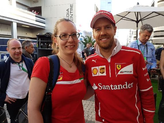 Iina with Sebastian Vettel.