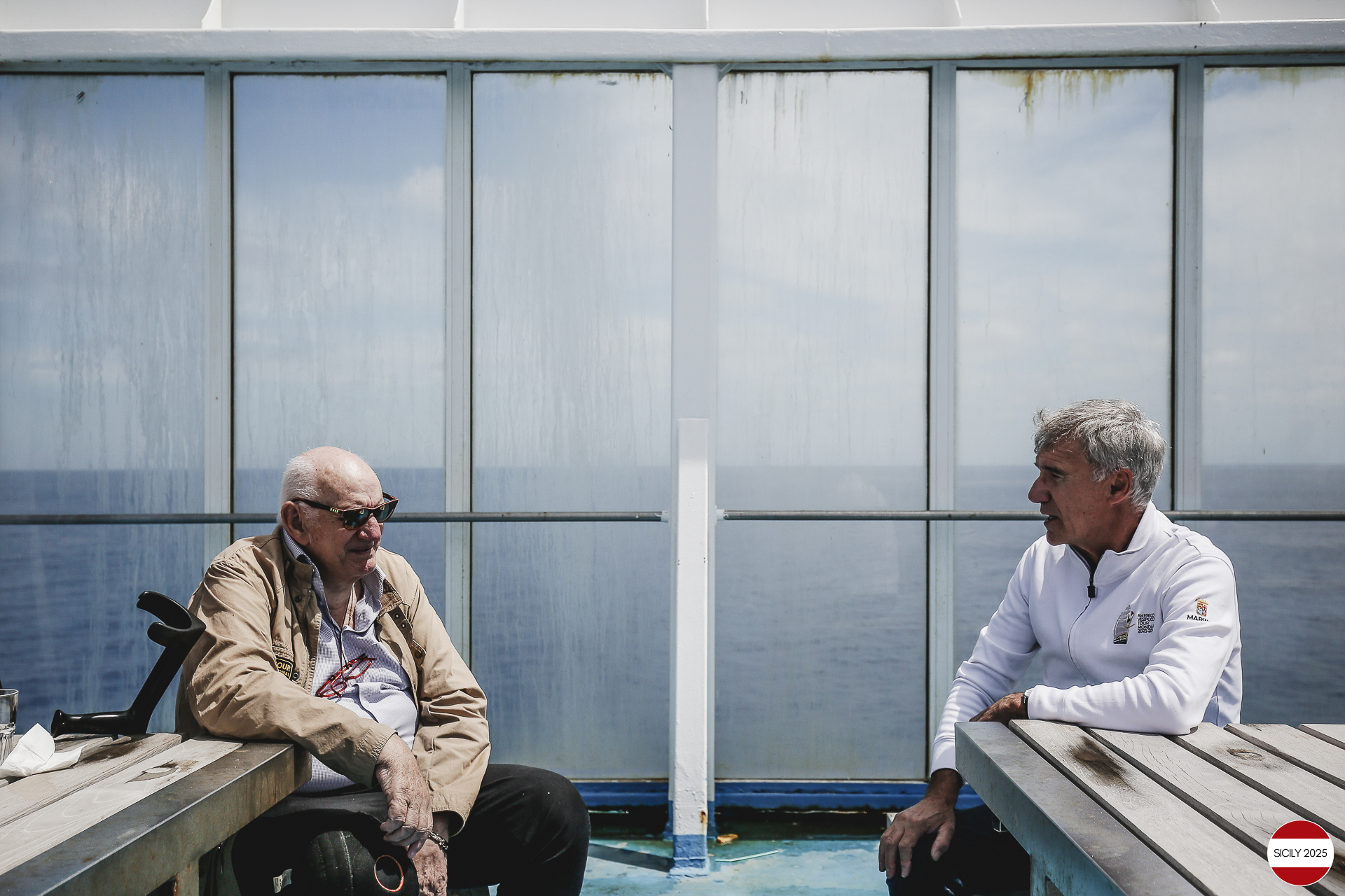 Ferrari drivers and their partners relax on the ship as it sails towards Palermo. 