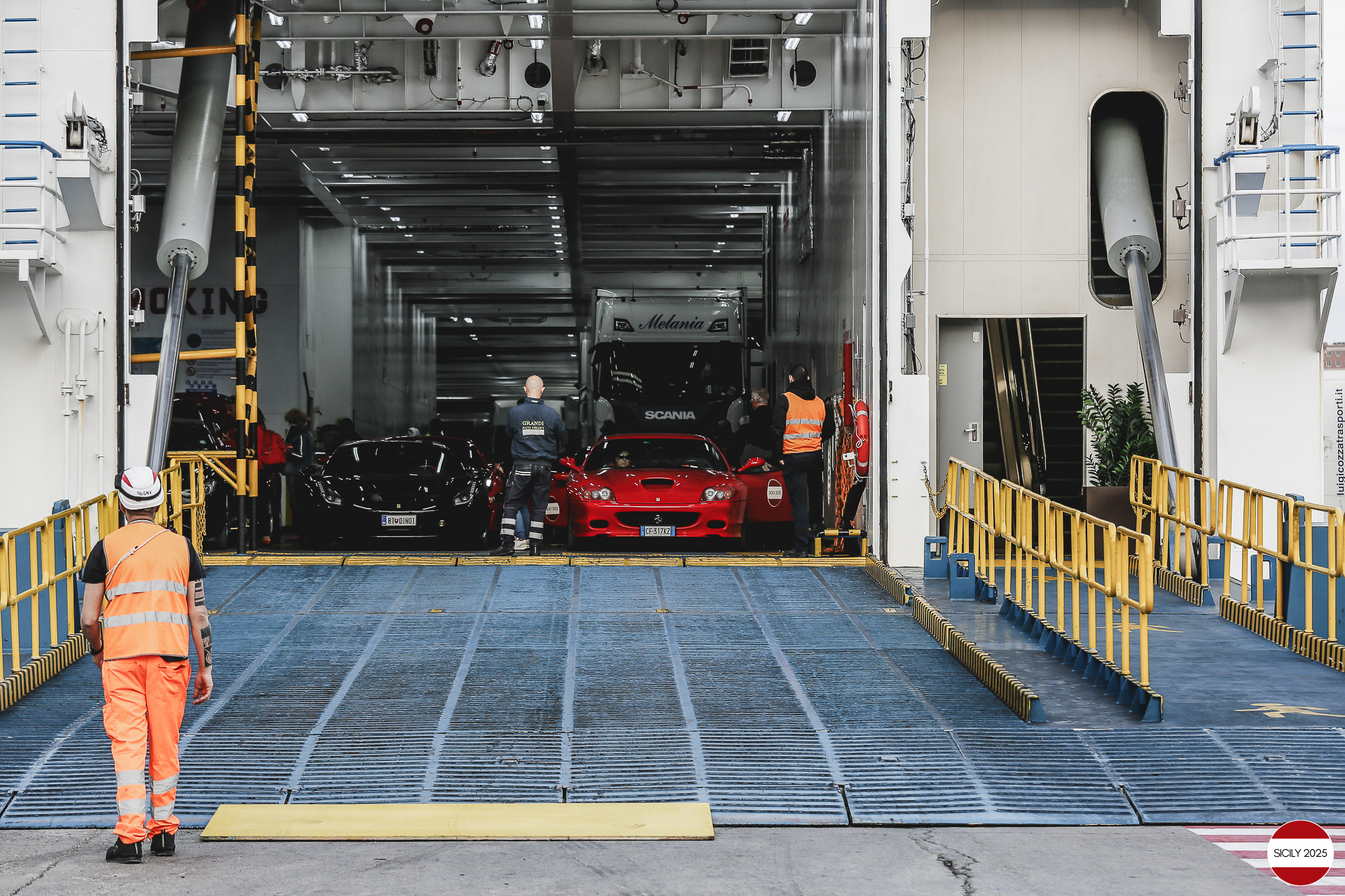 The cars disembark from the ship in Genoa. 