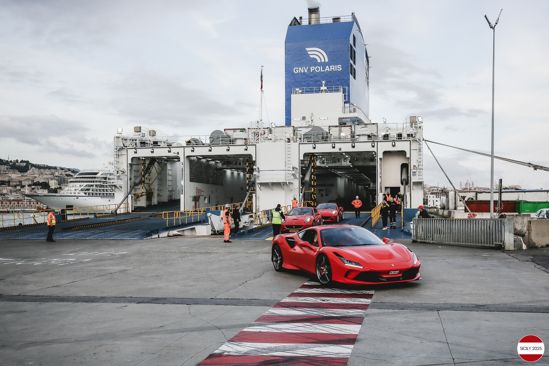 The cars disembark from the ship in Genoa. 