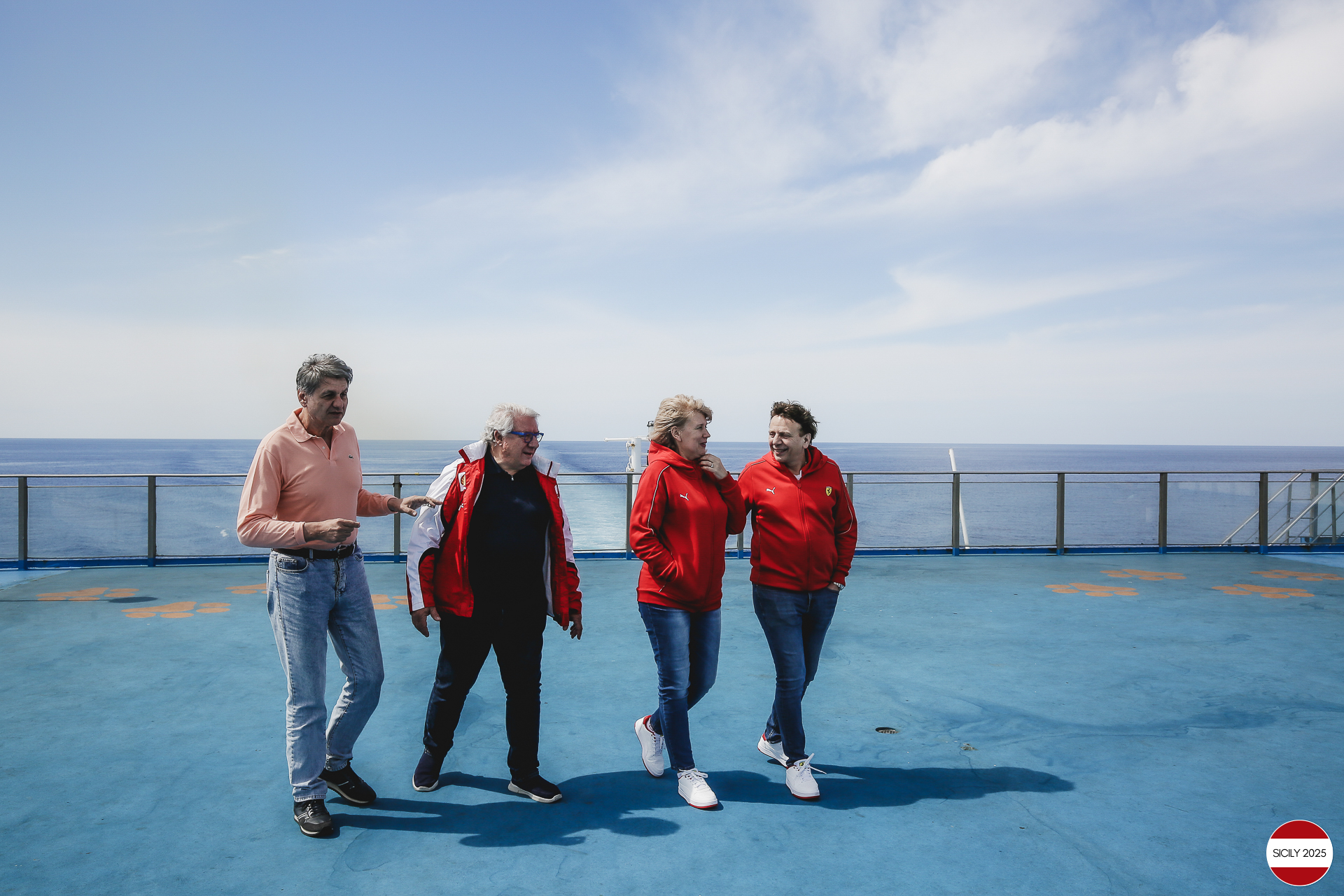 Ferrari drivers and their partners relax on the ship as it sails towards Palermo. 