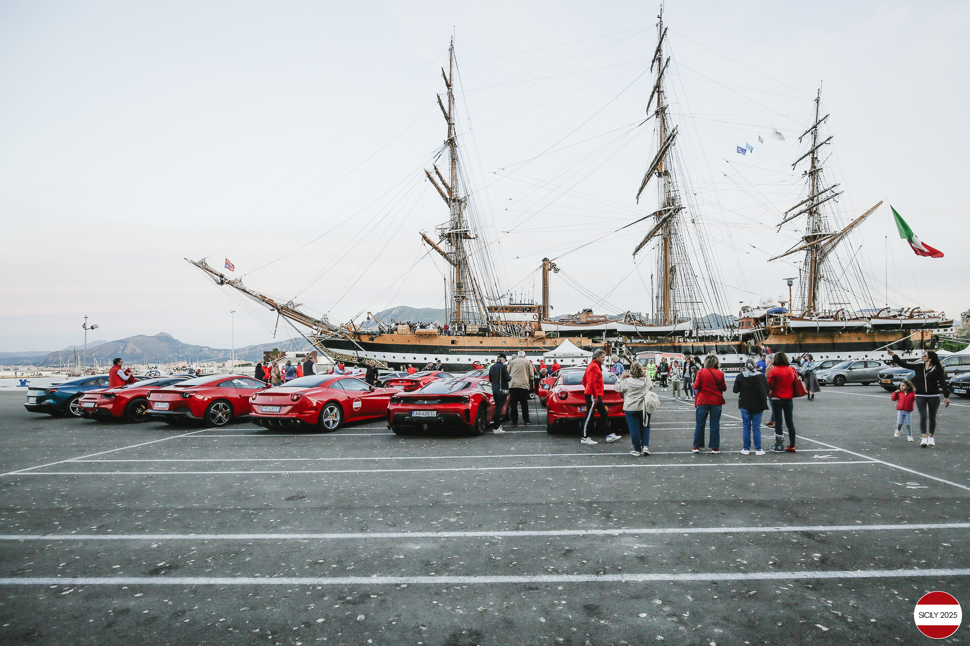 Parking of the Ferraris in front of the Amerigo Vespucci sailing ship immediately after disembarking from the ship in Palermo. 