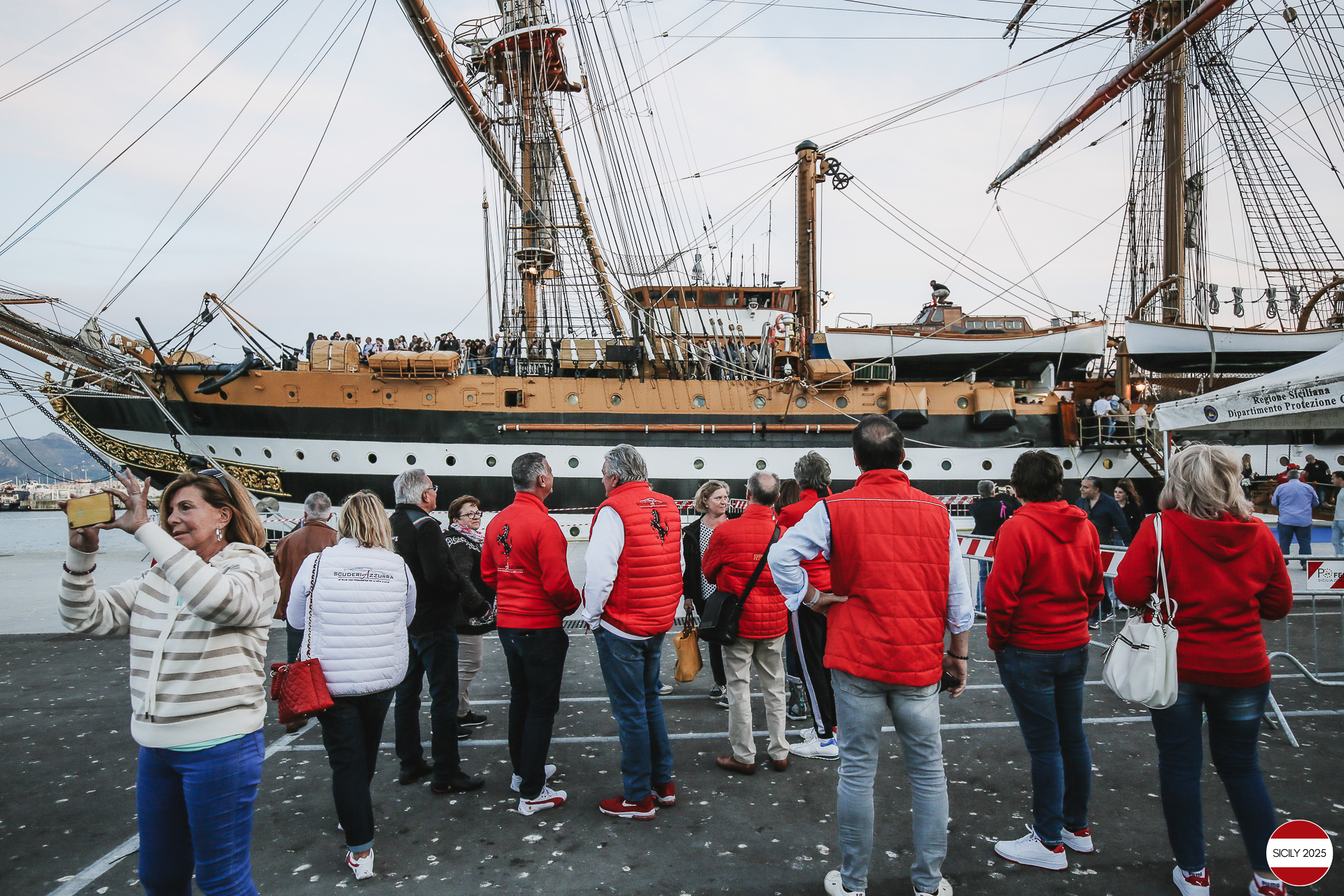 Parking of the Ferraris in front of the Amerigo Vespucci sailing ship immediately after disembarking from the ship in Palermo. 