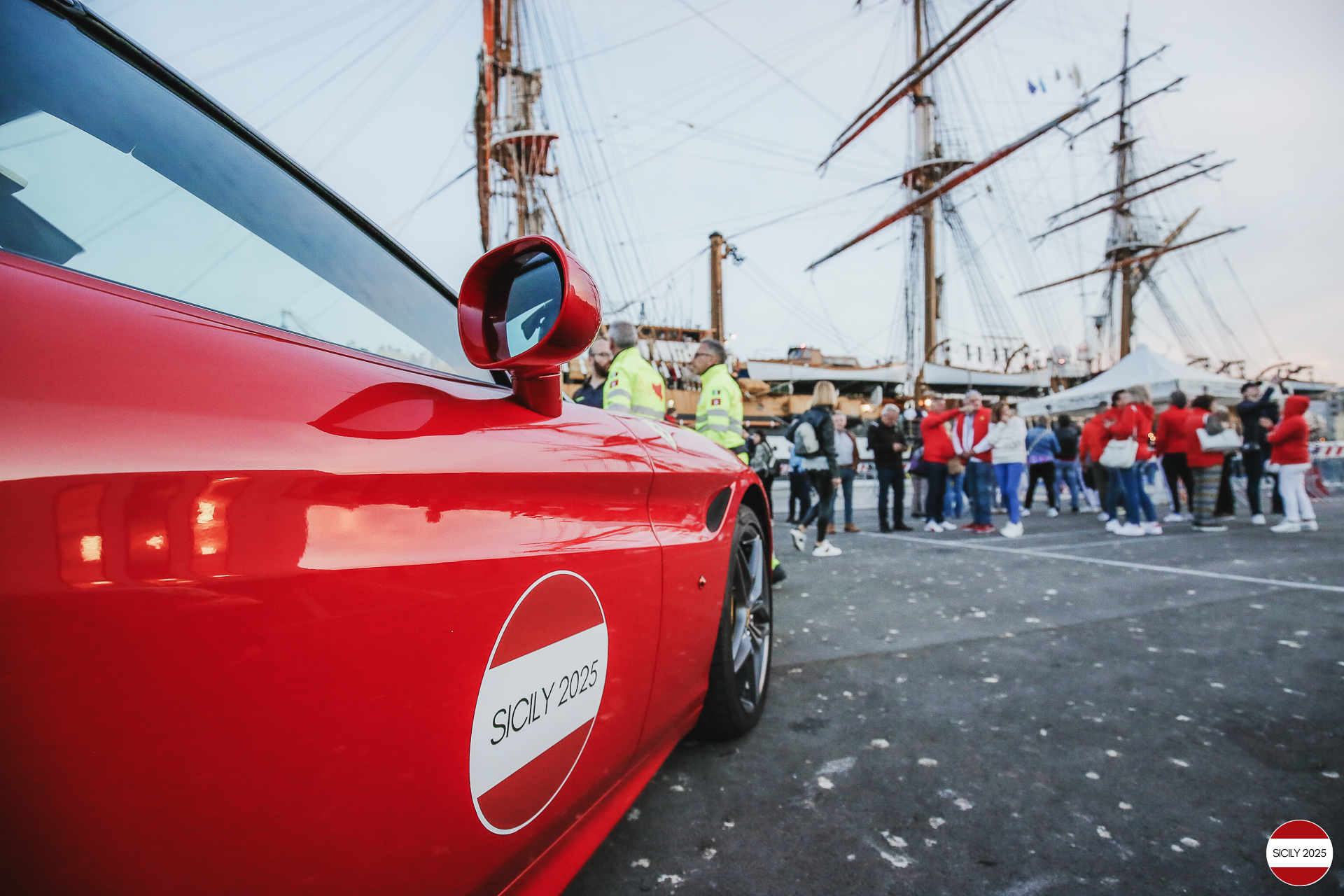 Parking of the Ferraris in front of the Amerigo Vespucci sailing ship immediately after disembarking from the ship in Palermo.