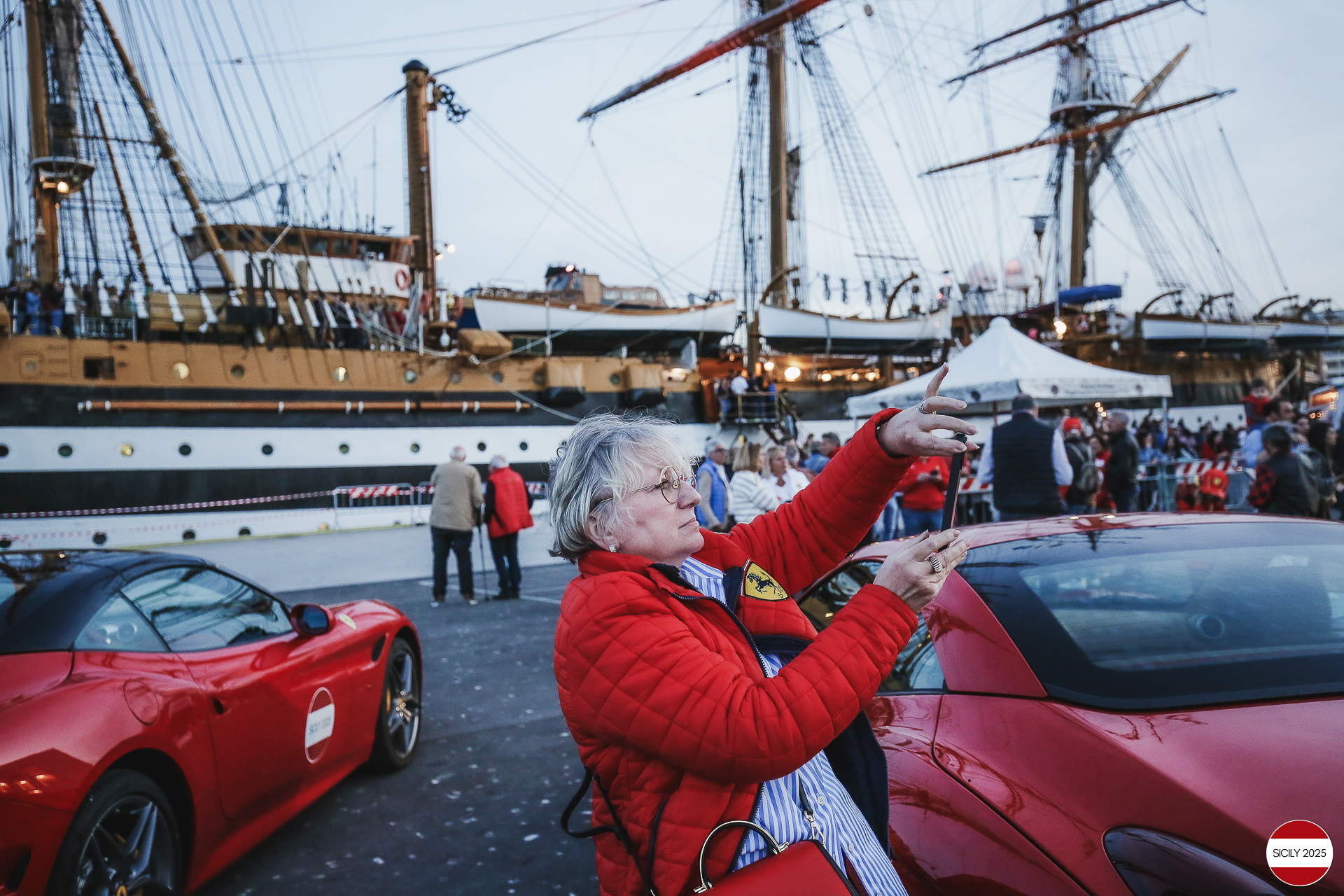 Parking of the Ferraris in front of the Amerigo Vespucci sailing ship immediately after disembarking from the ship in Palermo. 