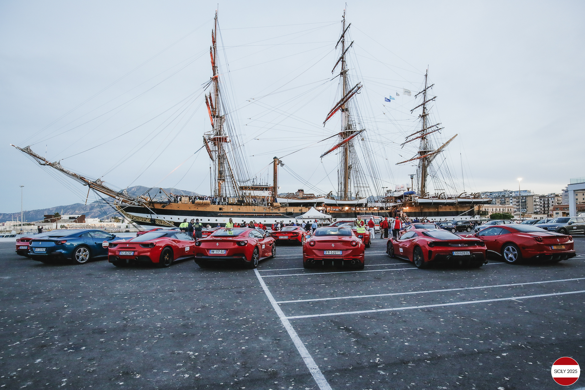 Parking of the Ferraris in front of the Amerigo Vespucci sailing ship immediately after disembarking from the ship in Palermo. 