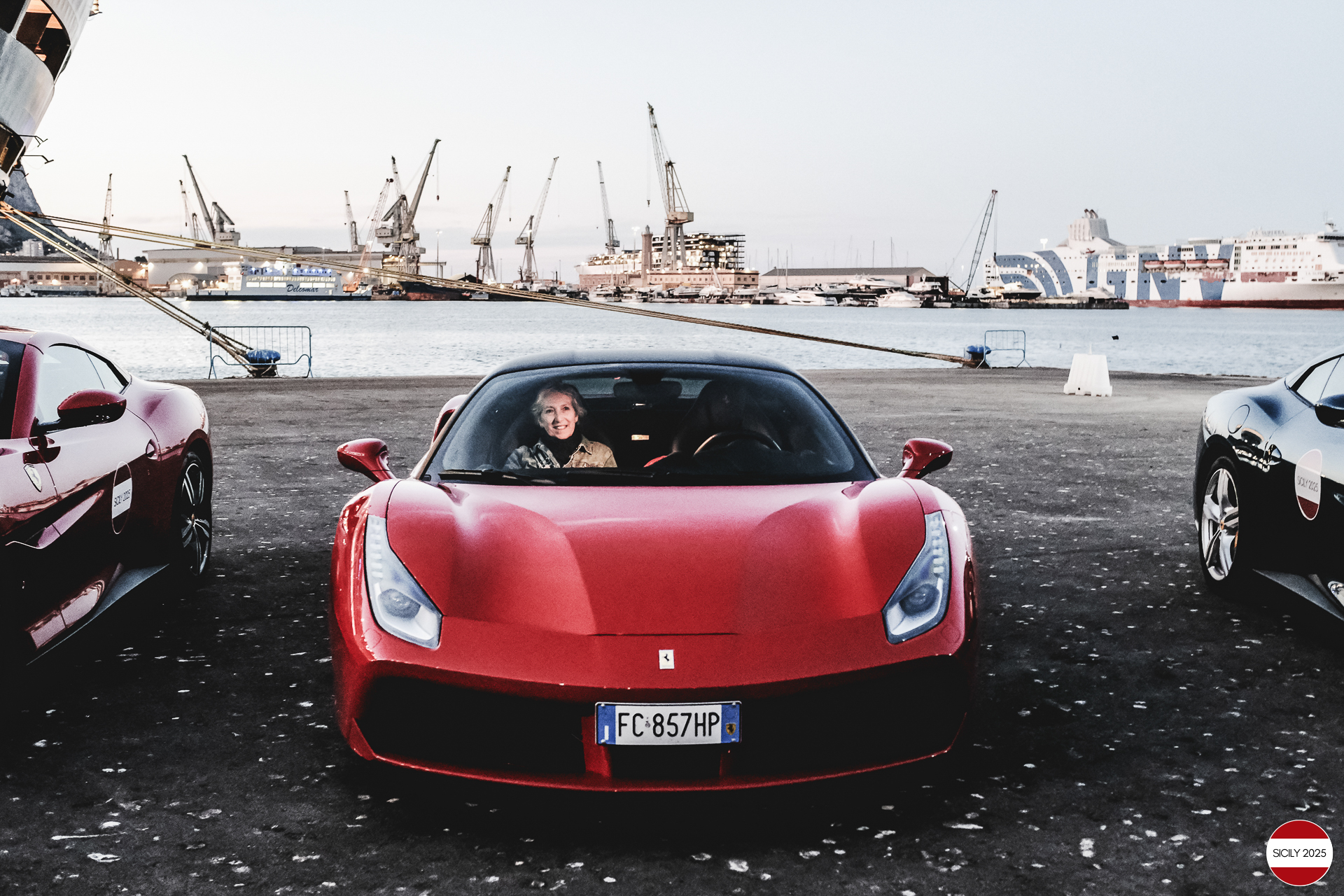 Parking of the Ferraris in front of the Amerigo Vespucci sailing ship immediately after disembarking from the ship in Palermo. 