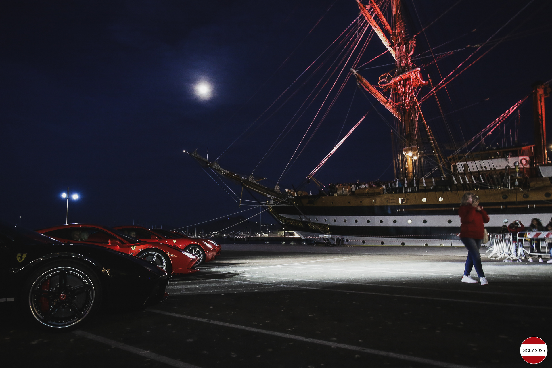 Parking of the Ferraris in front of the Amerigo Vespucci sailing ship immediately after disembarking from the ship in Palermo. 